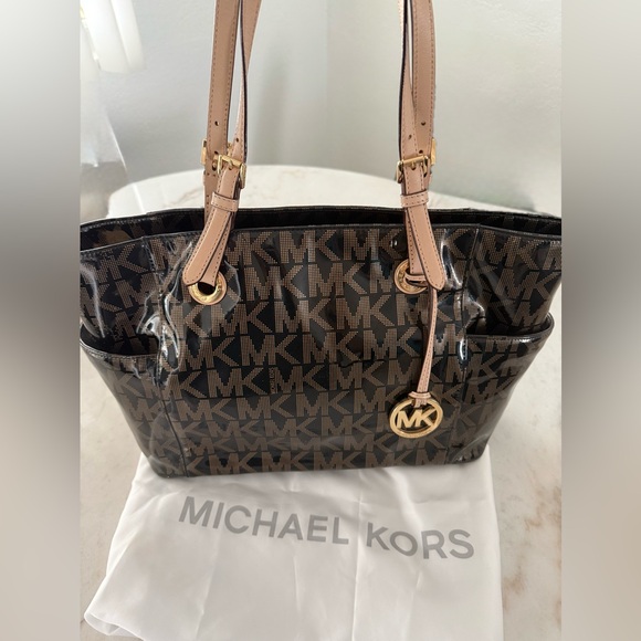 Michael Kors Black and Tan Signature Backpack - Picture 13 of 15